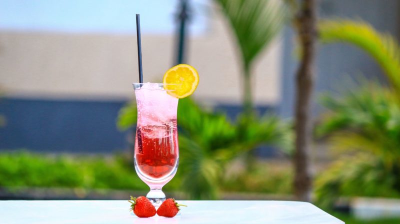 Strawberry and citrus non-alcoholic mocktail with garnish